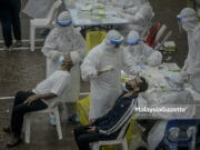 Covid-19 cases (Picture for representational purposes only). Healthcare workers conducting Covid-19 screening at the MPAJ AU2 Multipurpose Hall, Keramat, Selangor. PIX: AFFAN FAUZI / MalaysiaGazette /18 MAY 2021. new Covid-19 record