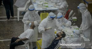 Covid-19 cases (Picture for representational purposes only). Healthcare workers conducting Covid-19 screening at the MPAJ AU2 Multipurpose Hall, Keramat, Selangor. PIX: AFFAN FAUZI / MalaysiaGazette /18 MAY 2021. new Covid-19 record