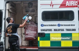 (Picture for representational purposes only). The owner of Raudhah Rich Auto, Mohamad Aries Nordin 39, sanitising an ambulance as an initiative to curb the spread of Covid-19. PIX: MOHD ADZLAN / MalaysiaGazette / 20 MAY 2021.