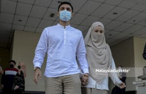 Celebrity cum entrepreneur, Neelofa and her celebrity Islamic preacher Haris Ismail (PU Riz) arrives at the Seremban Courts Complex in Negeri Sembilan to be charged for interstate travel to purchase carpet. PIX: AFFAN FAUZI / MalaysiaGazette / 20 MAY 2021. DNAA
