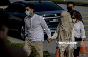 Celebrity cum entrepreneur, Neelofa and her celebrity Islamic preacher Haris Ismail (PU Riz) arrives at the Seremban Courts Complex in Negeri Sembilan to be charged for interstate travel to purchase carpet. PIX: AFFAN FAUZI / MalaysiaGazette / 20 MAY 2021.