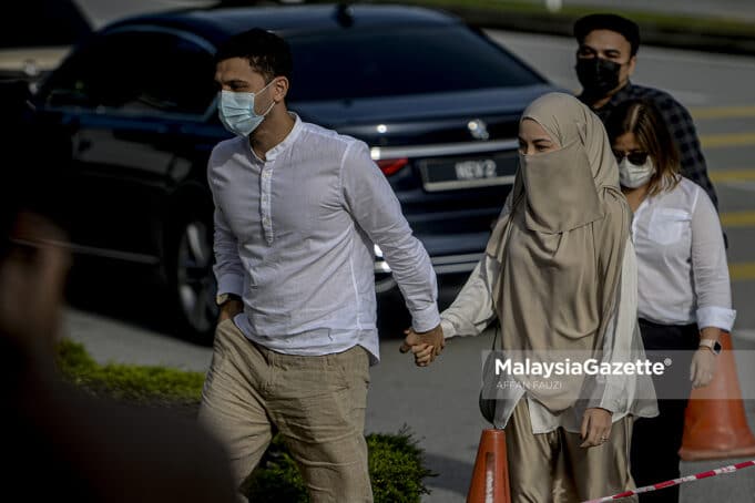 Celebrity cum entrepreneur, Neelofa and her celebrity Islamic preacher Haris Ismail (PU Riz) arrives at the Seremban Courts Complex in Negeri Sembilan to be charged for interstate travel to purchase carpet. PIX: AFFAN FAUZI / MalaysiaGazette / 20 MAY 2021.