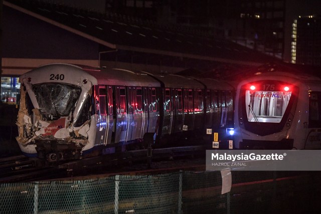 Workers from Prasarana conducting the towing works of the Light Rail Transit (LRT) trains involved in the tunnel accident between the Kampung Baru LRT Station and KLCC LRT Station on 24 May. The trains have been towed to the Subang Rapid Rail Complex in Selangor.     PIX: HAZROL ZAINAL / MalaysiaGazette / 27 MAY 2021.