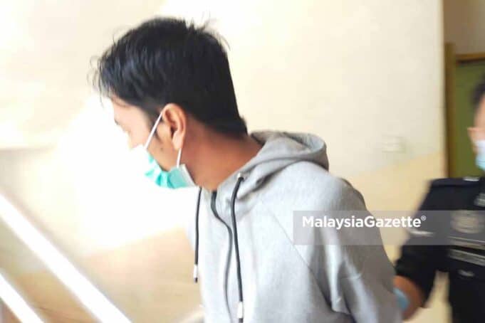 The man who hit his pregnant wife until she fell into coma at their house in Larkin, Johor was charged at the Magistrate Court this morning.