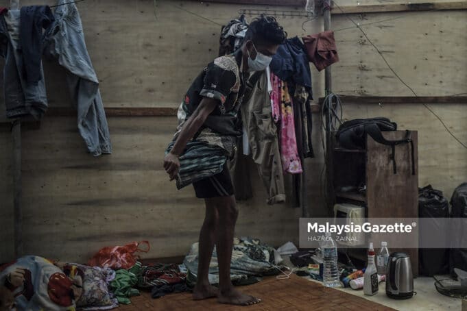 A foreign worker the workers dorm, at a construction site in Kuala Lumpur. PIX: HAZROL ZAINAL / MalaysiaGazette / 19 JUNE 2021. workers dormitory unfit for human Jalan Stonor