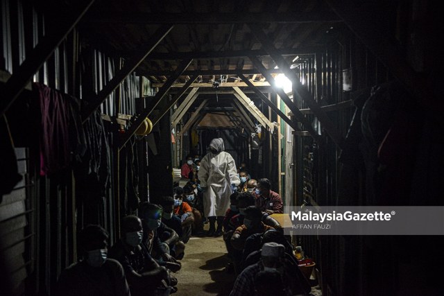 Among the foreigners arrested by the Department of Immigration in an integrated operation at a Residence Construction Site in Dengkil, Selangor.     PIX: AFFAN FAUZI / 21 JUNE 2021.