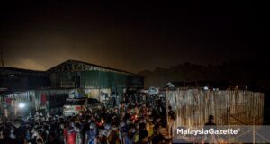 Among the foreigners arrested by the Department of Immigration in an integrated operation at a Residence Construction Site in Dengkil, Selangor. PIX: AFFAN FAUZI / 21 JUNE 2021. A large scale operation to curb illegal immigrants (PATI) at a construction site has led to the detention of 309 foreigners from various countries.