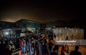 Among the foreigners arrested by the Department of Immigration in an integrated operation at a Residence Construction Site in Dengkil, Selangor. PIX: AFFAN FAUZI / 21 JUNE 2021. A large scale operation to curb illegal immigrants (PATI) at a construction site has led to the detention of 309 foreigners from various countries.