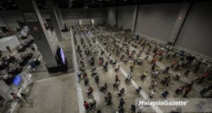 WHO World Health Organization Sinovac Covid-19 vaccineSenior citizens are filling forms and waiting to be called to receive their Covid-19 vaccine shot in the National Covid-19 Immunisation Programme (PICK) at the Malaysia International Trade and Exhibition Centre (MITEC) in Kuala Lumpur. PIX: AFFAN FAUZI / MalaysiaGazette / 31 MAY 2021.