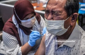 Lebih 13 juta individu lengkap dua dos vaksin