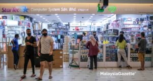 bookstores stationery computer shops The public start to visit shops selling telecommunication devices in Low Yat Plaza, Kuala Lumpur after the government allows them to operate throughout the National Recovery Plan (PPN). PIX: SYAFIQ AMBAK / Malaysiagazette / 16 JULY 2021