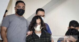 29-year-old suspect is held in remand for 4 days after provoking the police when he was fined for not wearing face mask. PIX: SYAFIQ AMBAK / MalaysiaGazette / 21 JULY 2021.