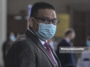 Former UMNO Supreme Council Member, Datuk Lokman Adam at the Kuala Lumpur Courts Complex. PIX : AFFAN FAUZI / MalaysiaGazette / 23 JULY 2020 contempt of court intimidating threatening 1MDB witness Amhari Effendi Nazaruddin, who is also the former special officer to Najib. Datuk Dr Mohd Na’im Mokhtar Syarie Chief Judge