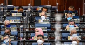 Deputy Prime Minister Datuk Seri Ismail Sabri Yaakob (right) along with the cabinet ministers at the Special Parliament Sitting at the Dewan Rakyat in Kuala Lumpur. PIX: Courtesy of The Department of Information / MalaysiaGazette / 26 JULY 2021.
