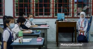 school session takwim sekolah 2022 term school holidays (Picture for representational purposes only). Year One students during their first day of new school session at Sekolah Jenis Kebangsaan Cina Khai Chee, Segambut. PIX: HAFIZ SOHAIMI / MalaysiaGazette /01 MARCH 2021