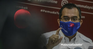UMNO Youth Chief Datuk Dr. Asyraf Wajdi Dusuki at a news conference on the legitimacy of Tan Sri Muhyiddin Yassin as the Prime Minister and the Perikatan Nasional (PN) government. PIX: AFFAN FAUZI / MalaysiaGazette / 12 AUGUST 2021. Interim Unity Government