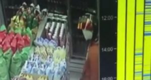 A screenshot of the CCTV footage showing the suspect masturbating at a convenience store in Balik Pulau, Penang.