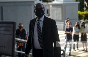 Perbicaraan kes pinda laporan audit 1MDB ditangguh
