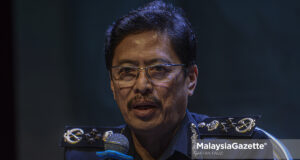 Securities Commission SC trading account Chief Commissioner Malaysian Anti-Corruption Commission MACC Azam Baki Hasanah Abdul Majid MEIO