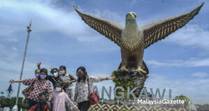 Langkawi travel bubble Hotel staff Covid-19 positive temporary closure travel bubble