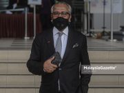 Lawyer, Tan Sri Muhammad Shafee Abdullah leaves the court after the proceeding of his application to reclaim his passport to fly to the United States. PIX: AFFAN FAUZI / MalaysiaGazette / 25 OCTOBER 2021.