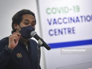 KJ denies viral screenshot on his vaccination status fully vaccinated Omicron variant VOC reinfection rate Malaysia-Singapore Vaccinated Travel Lane VTL Covid-19 positive Antivaxxers dajjal Covid-19 vaccine Khairy Jamaluddin KJ