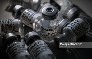 Pfizer -BioNTech Covid-19 vaccine Comirnaty booster shot dose