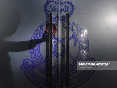 drug case police lockup escapee Perak state assemblyman drug PDRM murder case Jalan Ampang logo