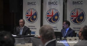 PPN The Chairman of National Recovery Council (MPN), Tan Sri Muhyiddin Yassin speaks during the National Recovery Dialogue and the Roundtable Meeting with the British Malaysian Chamber of Commerce (BMCC) at the Mandarin Oriental Hotel in Kuala Lumpur. PIX: HAZROL ZAINAL / MalaysiaGazette / 17 NOVEMBER 2021
