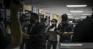 A member of the Malaysian Armed Forces (MAF), Zynetlee Von Zim, 27 arrives at the Ampang Magistrate Court, Selangor to face charges for outraging the modesty of a staff at a vape shop on 5 October. PIX: AFFAN FAUZI / MalaysiaGazette / 19 NOVEMBER 2021. A member of the Malaysian Armed Forces (MAF) pleaded not guilty at the Ampang Magistrate Court for outraging the modesty of an 18 years-old girl at a vape shop last month.