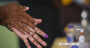 Mengundi