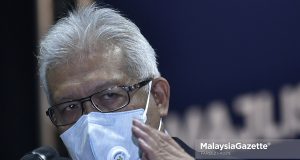 Home Minister, Datuk Seri Hamzah Zainudin at a news conference at the Kuala Lumpur Convention Centre. PIX: FAREEZ FADZIL / MalaysiaGazette / 25 NOVEMBER 2021 Perikatan Nasional three corner fight PN 3 election