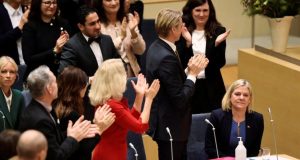 Many MPs gave Magdalena Andersson (right) a standing ovation in the Riksdag earlier on Wednesday. PIX: REUTERS via BBC