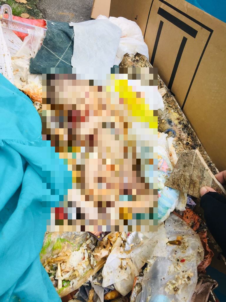    A DBKL garbage collector found a body of a newborn baby with umbilical cord still intact in a trash bin at Cheras yesterday evening.     PIX: Courtery of Cheras District Police Headquarters