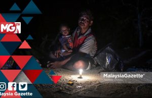 MGNews: Sungai Lui: Gigih Hulur Bantuan Bertemankan Cahaya Samar
