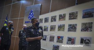 The Director of Bukit Aman Narcotics Crime Investigation Department (NCID), Datuk Ayob Khan Mydin Pitchay showing the pictures of Operasi Tapis Khas (Special Screening Operation) at the Bukit Aman Police Headquarters in Kuala Lumpur. PIX: HAZROL ZAINAL / MalaysiaGazette / 25 JANUARY 2022