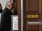 Azmi Tahir Jho Low Taek Jho Former Prime Minister Datuk Seri Najib Tun Razak arrives at the Kuala Lumpur Court Complex for his money-laundering trial involving 1Malaysia Development Berhad (1MDB) funds. PIX: AFFAN FAUZI / MalaysiaGazette / 26 JANUARY 2022