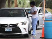 Guru ‘letak’ anak positif Covid-19 dalam but kereta