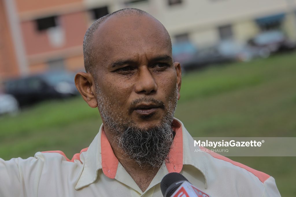 The Residence Chairman of Taman Melati 4A, Mohd Azhar Md Rosdy speaks to the media after the residents at the Taman Melati Flat in Setapak, Kuala Lumpur lost their roof in a rainstorm. PIX: AMIRUL SHAUFIQ / MalaysiaGazette / 07 FEBRUARY 2022
