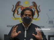 Langgar SOP, KJ arah KKM kompaun pemimpin BN di Johor antivaxxers Khairy Jamaluddin's son inject air Covid-19 vaccine parents