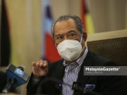 The Chairman of National Recovery Council (MPN), Tan Sri Muhyiddin Yassin at a news conference after chairing the MPN Meeting at the Ministry of Finance in Putrajaya. PIX: AMIRUL SHAUFIQ / MalaysiaGazette / 22 FEBRUARY 2022. sumpah laknak Ahmad Zahid Hamidi corruption trial court case UMNO 1MDB debt Najib Razak