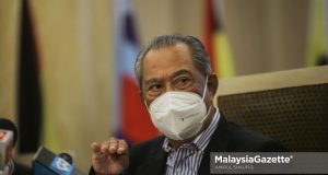 The Chairman of National Recovery Council (MPN), Tan Sri Muhyiddin Yassin at a news conference after chairing the MPN Meeting at the Ministry of Finance in Putrajaya. PIX: AMIRUL SHAUFIQ / MalaysiaGazette / 22 FEBRUARY 2022. sumpah laknak Ahmad Zahid Hamidi corruption trial court case UMNO 1MDB debt Najib Razak