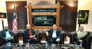 The panellists, Prof Emeritus Dr Barjoyai Bardai (second left), Datuk Shamsudin Bardan; (second right), Datuk Dr Raduan Che Ros and moderator, Prof Dr Durrishah Idrus. minimum wage foreign workers