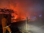 Budak 11 tahun rentung dalam kebakaran kilang getah sintetik The Fire and Rescue Department putting out the fire at a synthetic rubber factory at Sungai Petani, Kedah early this morning.