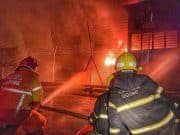 The Fire and Rescue Department putting out the fire at a synthetic rubber factory at Sungai Petani, Kedah early this morning. 11 years-old girl charred to death
