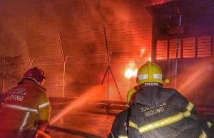 The Fire and Rescue Department putting out the fire at a synthetic rubber factory at Sungai Petani, Kedah early this morning. 11 years-old girl charred to death