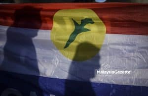 UMNO flag SRC International money-laundering misappropriation