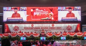 The President of UMNO, Datuk Seri Dr Ahmad Zahid Hamidi speaks during the UMNO General Assembly (PAU) 2021 at the World Trade Centre Kuala Lumpur (WTCKL). PIX: MOHD ADZLAN / MalaysiaGazette / 18 MARCH 2022 divisions support party election GE15