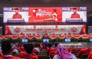 The President of UMNO, Datuk Seri Dr Ahmad Zahid Hamidi speaks during the UMNO General Assembly (PAU) 2021 at the World Trade Centre Kuala Lumpur (WTCKL). PIX: MOHD ADZLAN / MalaysiaGazette / 18 MARCH 2022 divisions support party election GE15