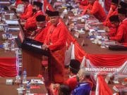 The President of UMNO, Datuk Seri Dr Ahmad Zahid Hamidi speaks during the UMNO General Assembly (PAU) 2021 at the World Trade Centre Kuala Lumpur (WTCKL). PIX: MOHD ADZLAN / MalaysiaGazette / 18 MARCH 2022 PM Ismail Sabri PAU 2021